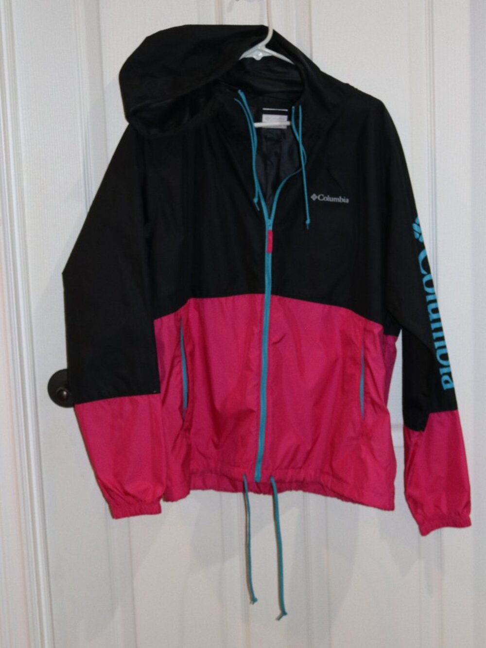 Columbia black, pink, teal hooded windbreaker. New. XL.